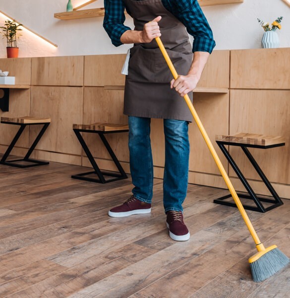 sweeping hardwood | Family Floors