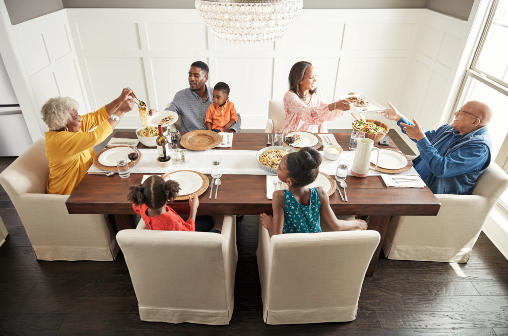 Family having breakfast at the dining table | Family Floors